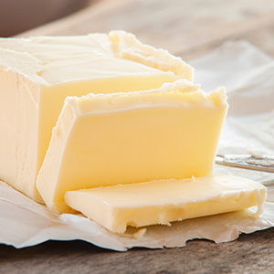 Stick of butter, cut close up